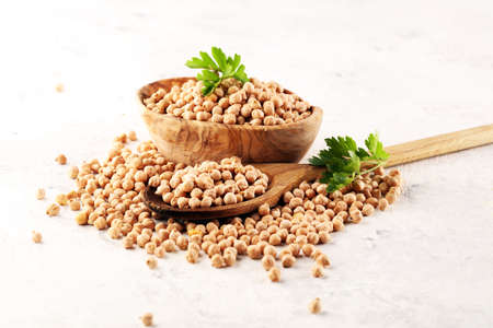 Raw Chickpeas in a bowl. Chickpeas is nutritious food. Healthy and natural vegetarian foodの写真素材