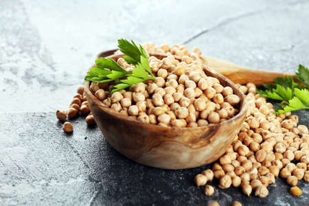Raw Chickpeas in a bowl. Chickpeas is nutritious food. Healthy and natural vegetarian foodの写真素材