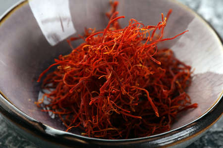Kesar, Saffron, Crocus Sativus on rustic table, Pile of Saffronの写真素材