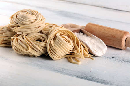 Closeup of raw fresh homemade pasta. fresh italian traditional raw pastaの写真素材