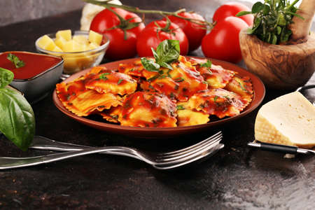 Ravioli with tomato sauce and basil. Homemade italian ravioli for dinnerの写真素材