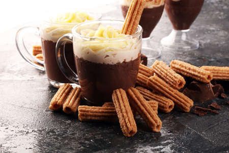 Traditional Spanish dessert churros with sugar and chocolate.の写真素材