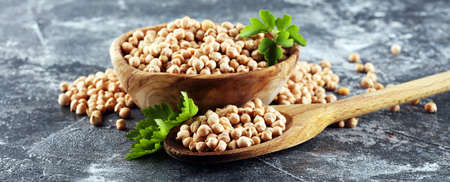 Raw Chickpeas in a bowl. Chickpeas is nutritious food. Healthy and natural vegetarian foodの写真素材