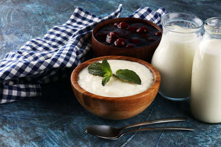 Rice porridge or milk rice pudding with syrup in a vintage bowl for a tasty breakfast.の写真素材