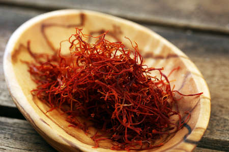 Kesar, Saffron, Crocus Sativus on rustic table, Pile of Saffronの写真素材