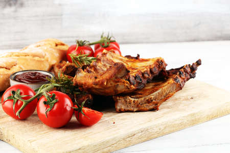 Grilled spare ribs for a tasty bbq meat with spicy barbecue sauceの写真素材