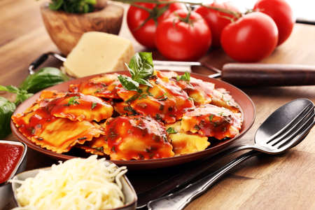 Ravioli with tomato sauce and basil. Homemade italian ravioli for dinnerの写真素材