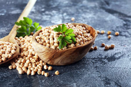 Raw Chickpeas in a bowl. Chickpeas is nutritious food. Healthy and natural vegetarian foodの写真素材