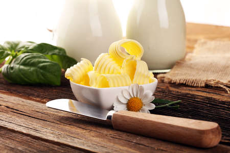 butter swirls. margarine or spread, fatty natural dairy product. High-calorie food for cooking and eatingの写真素材