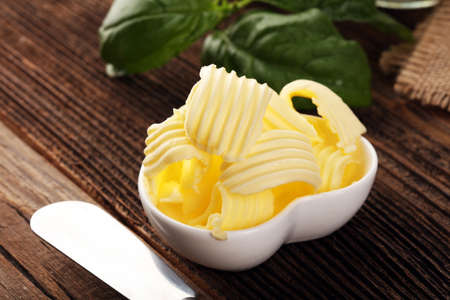 butter swirls. margarine or spread, fatty natural dairy product. High-calorie food for cooking and eatingの写真素材