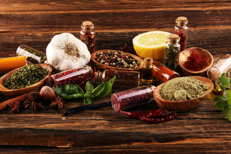 Spices and herbs on table. Food and cuisine ingredients with paprika and curry.の写真素材