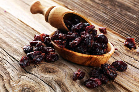Heap of dried cranberries on table. Dry Fruit Foodの写真素材