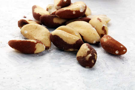 Brazil nuts on vintage background. unshelled healthy vegetarian foodの写真素材