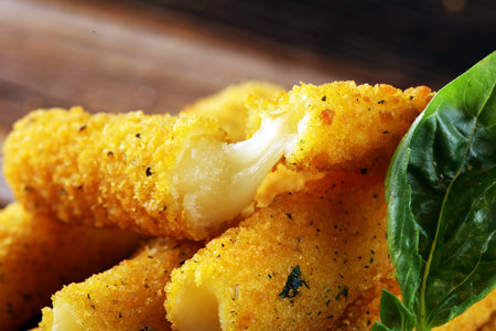 Breaded mozzarella cheese sticks for delicious meal