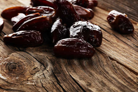 Raw Organic Medjool Dates Ready to Eat. Healthy vegetarian food on backgroundの写真素材