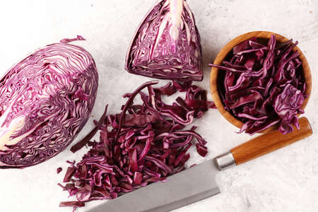 Chopped fresh red cabbage. Prepare sliced vegetable for cooking purple cabbage salad or coleslaw. Homemade fresh food concept.の写真素材