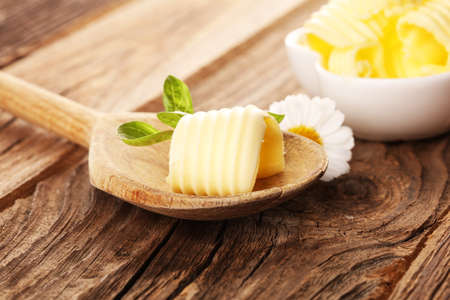 butter swirls. margarine or spread, fatty natural dairy product. High-calorie food for cooking and eating dairyの写真素材