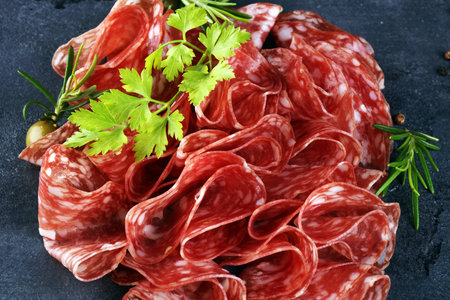 thinly sliced salami. delicious snack rustic salami.