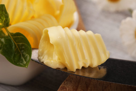 butter swirls. margarine or spread, fatty natural dairy product. High-calorie food for cooking and...