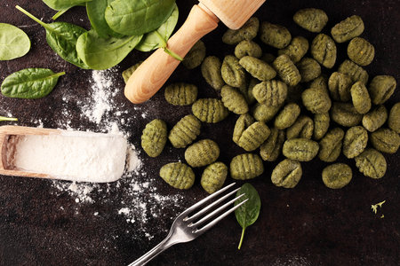 hand made gnocchi with fresh Spinach. italian traditional gnocchi on tableの写真素材
