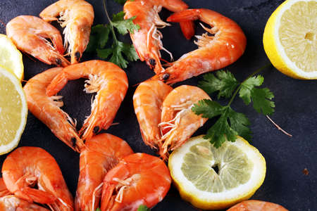 Raw fresh Prawns Langostino Austral. shrimp seafood with lemon and spices.の写真素材