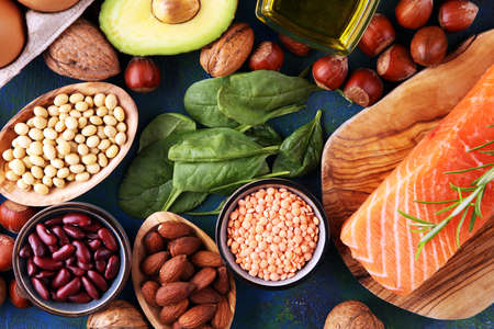 Selection of healthy food for heart, life concept with eggs and avocado on tableの写真素材