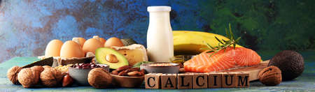 Best Calcium Rich Foods Sources. Healthy eating. Foods rich in calcium such as bean, almonds, hazelnuts, spinach leaves, cheese, and milkの写真素材