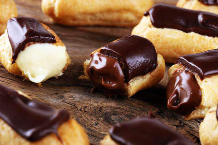 Traditional French dessert. Eclair with chocolate icing. Pastery sweet conceptの写真素材