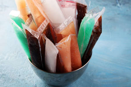 Colorful frozen fruit bar ice pops. with fruit tasteの写真素材