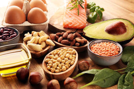 Selection of healthy food for heart, life concept with eggs and avocado on tableの写真素材