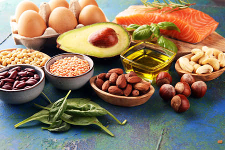 Selection of healthy food for heart, life concept with eggs and avocado on tableの写真素材