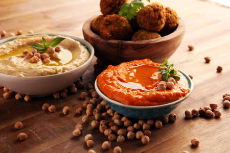 Traditional homemade hummus, falafel and chickpea on background. Jewish Cuisine.の写真素材