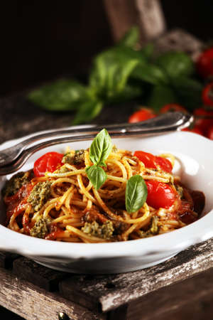 Plate of delicious spaghetti Bolognaise or Bolognese with savory minced beef and tomato sauce garnished with parmesan cheeseの写真素材