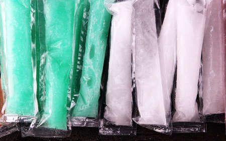 Colorful frozen fruit bar ice pops.の写真素材