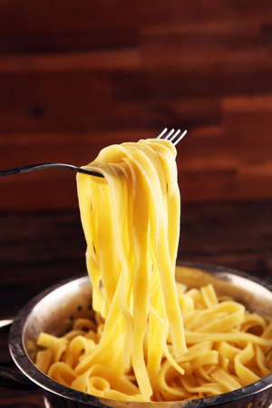 Closeup of raw fresh homemade pasta. fresh italian traditional raw pastaの写真素材