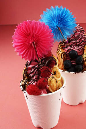 Hong Kong style egg waffle. bubble waffle with sundae ice cream and fruits. street food wafflesの写真素材