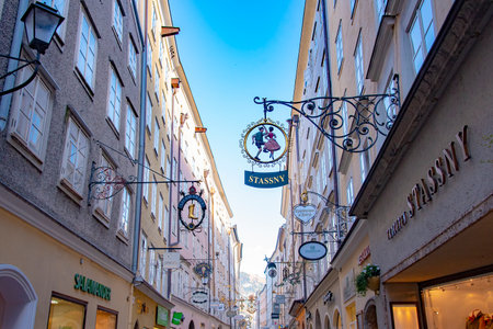 View of famous shopping street Getreidegasse which is near to Wolfgang Amadeus Mozart birthplace. Taken in Salzburg, Austria, October 20, 2016のeditorial素材