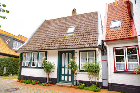 Beautiful old houses in Holm, which is an old fishing village, founded around 1000 a.c. at the Schlei, formerly an island now connected to the town of Schleswig. There are picturesque houses and cobbled roads. Taken on July 15,2016のeditorial素材