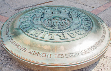 Iron plate with an emblem of Berlin with German Eagle near St Nicholas church in Nikolaikirchplatz, Berlin. Taken in Berlin, Germany on July 21, 2016のeditorial素材