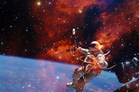 Astronaut. Nebula, cluster of stars in deep space. Science fiction art.
