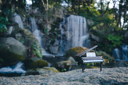 water fall and pianoの写真素材