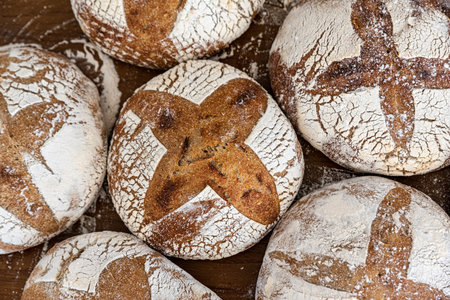 Raw loaves of breadの写真素材