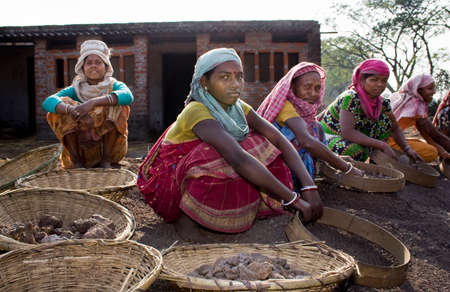 At rest: A group of Indian crusher labors are taking rest between their works.のeditorial素材