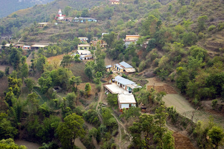 Tourist huts and local houses are in the slope of mountains at the tourist destination Shimla in...