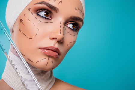 Close up photo of lady aesthetic medicine patient measure face with ruler look on cyan color empty...