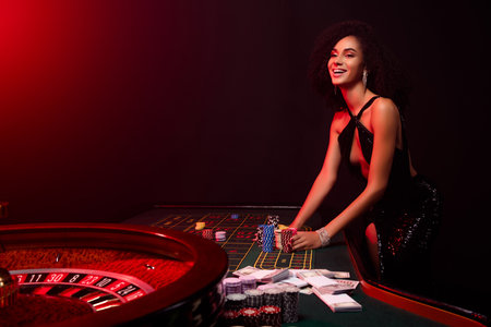 Photo of chic stunning girl on private party poker club playing bet million money have incredible luck winningの写真素材