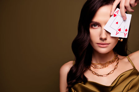 Photo of stunning elegant rich woman close eye with cards combination empty space on brown color...