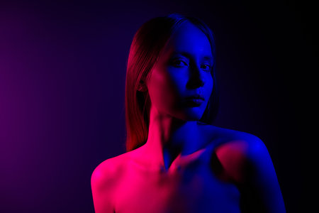 Photo of portrait of stunning girl look feel tempting isolated ultraviolet color neon backgroundの写真素材