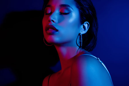 Photo of pretty cool lady wear elegant dress closed eyes enjoying party isolated dark blue color...