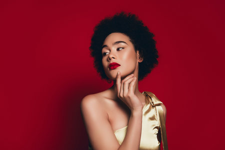 Photo of gorgeous beautiful model woman touch face smooth skin isolated on red background